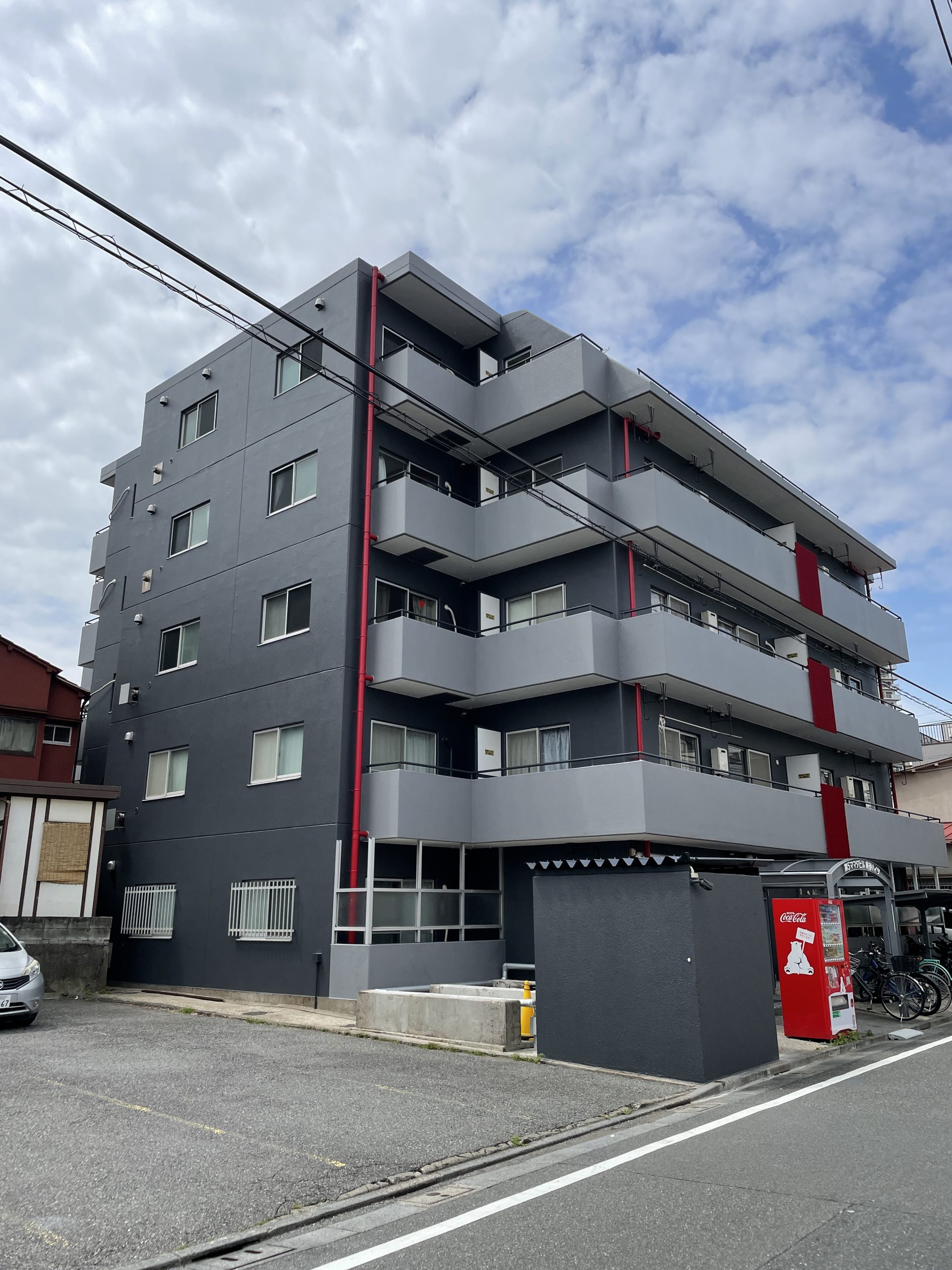 東京都江東区マンション(大規模修繕工事/防水工事/外壁塗装工事/ダークグレー/グレー/レッド)After画像