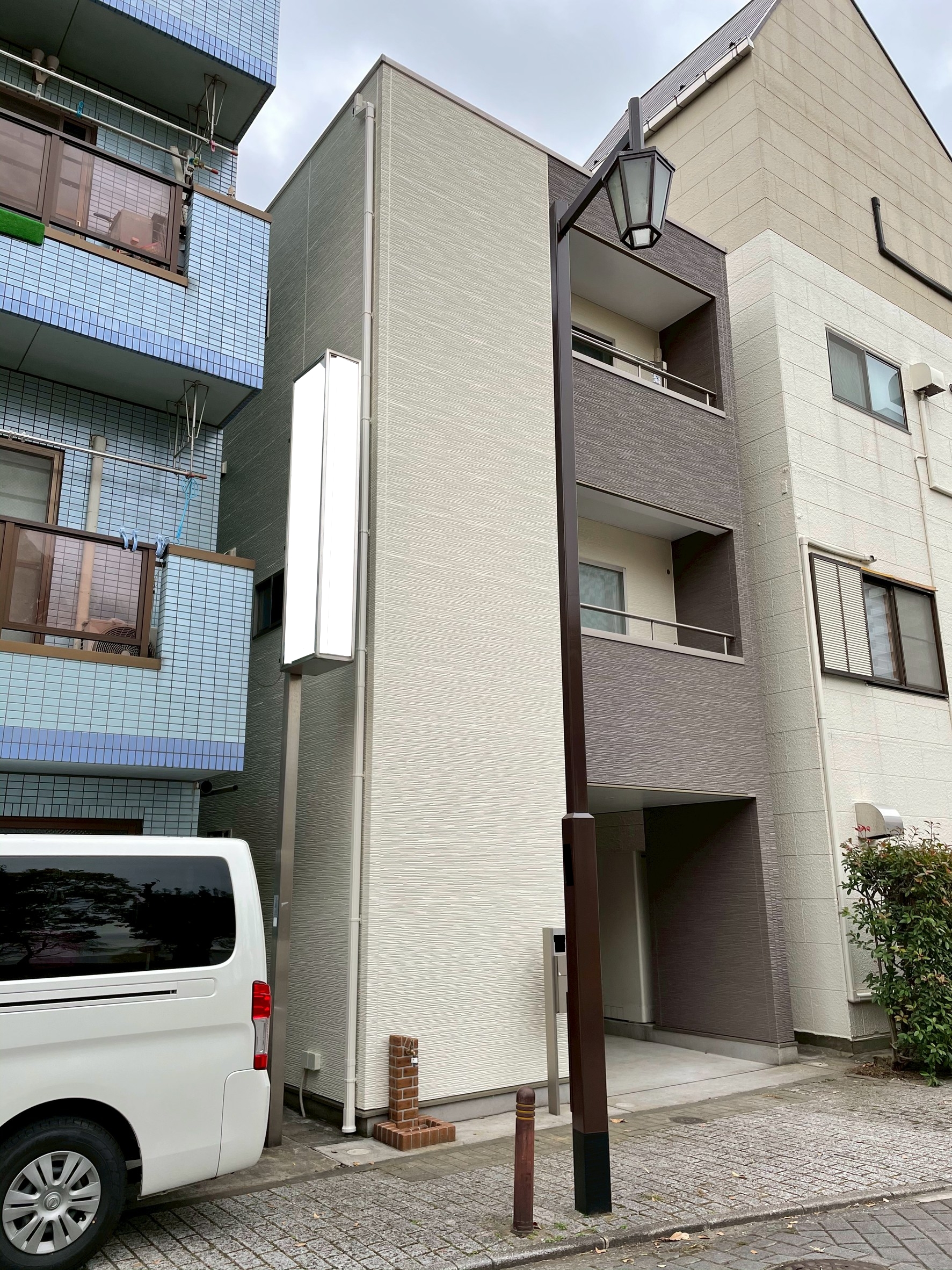 東京都荒川区（外壁塗装/アパート/アイボリー/ブラウン/ツートーン）After画像